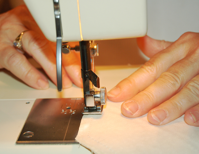 sewing-hands-1418016-638x493